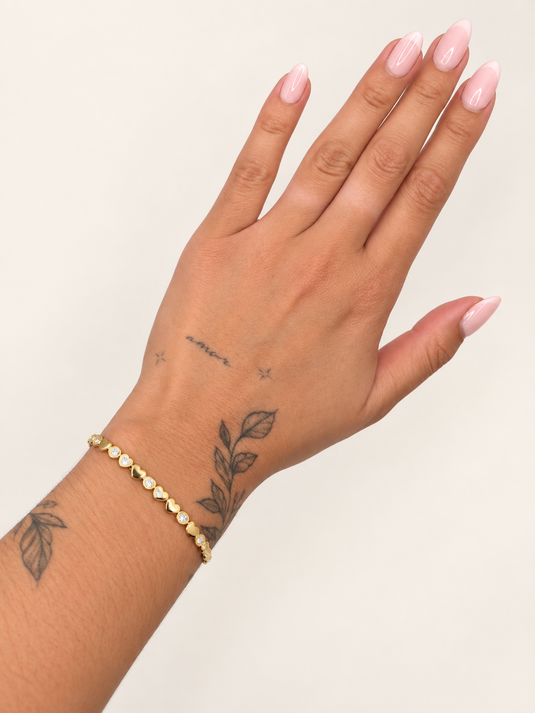 Tennis armband hartjes goudkleurig