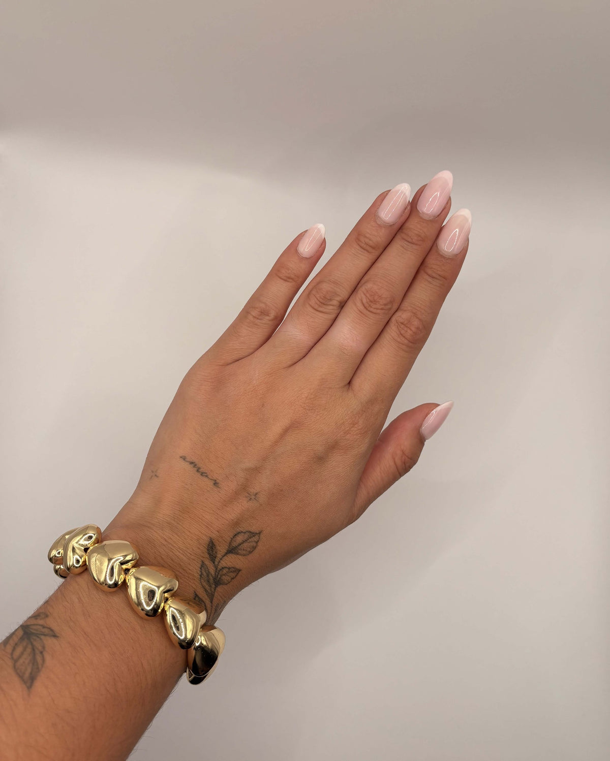 Elastisch armband groot hart goudkleurig