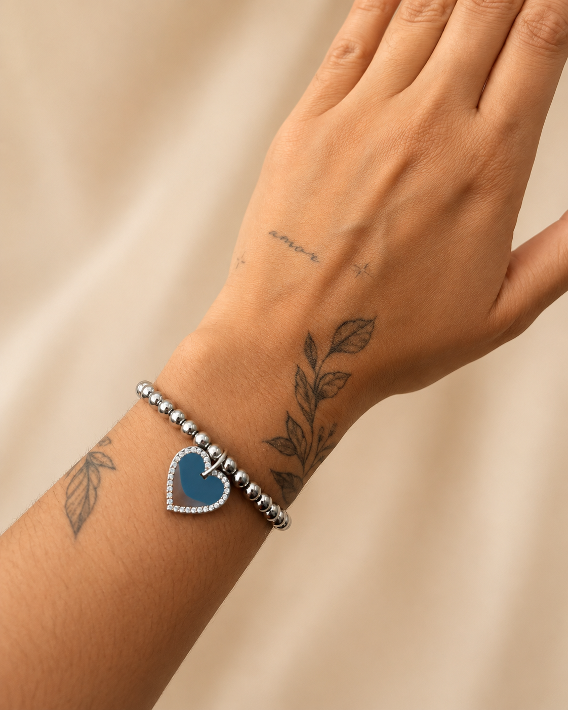 Armbandje met hartje en steentjes zilver