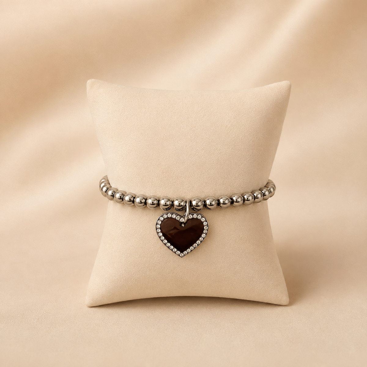 Armbandje met hartje en steentjes zilver