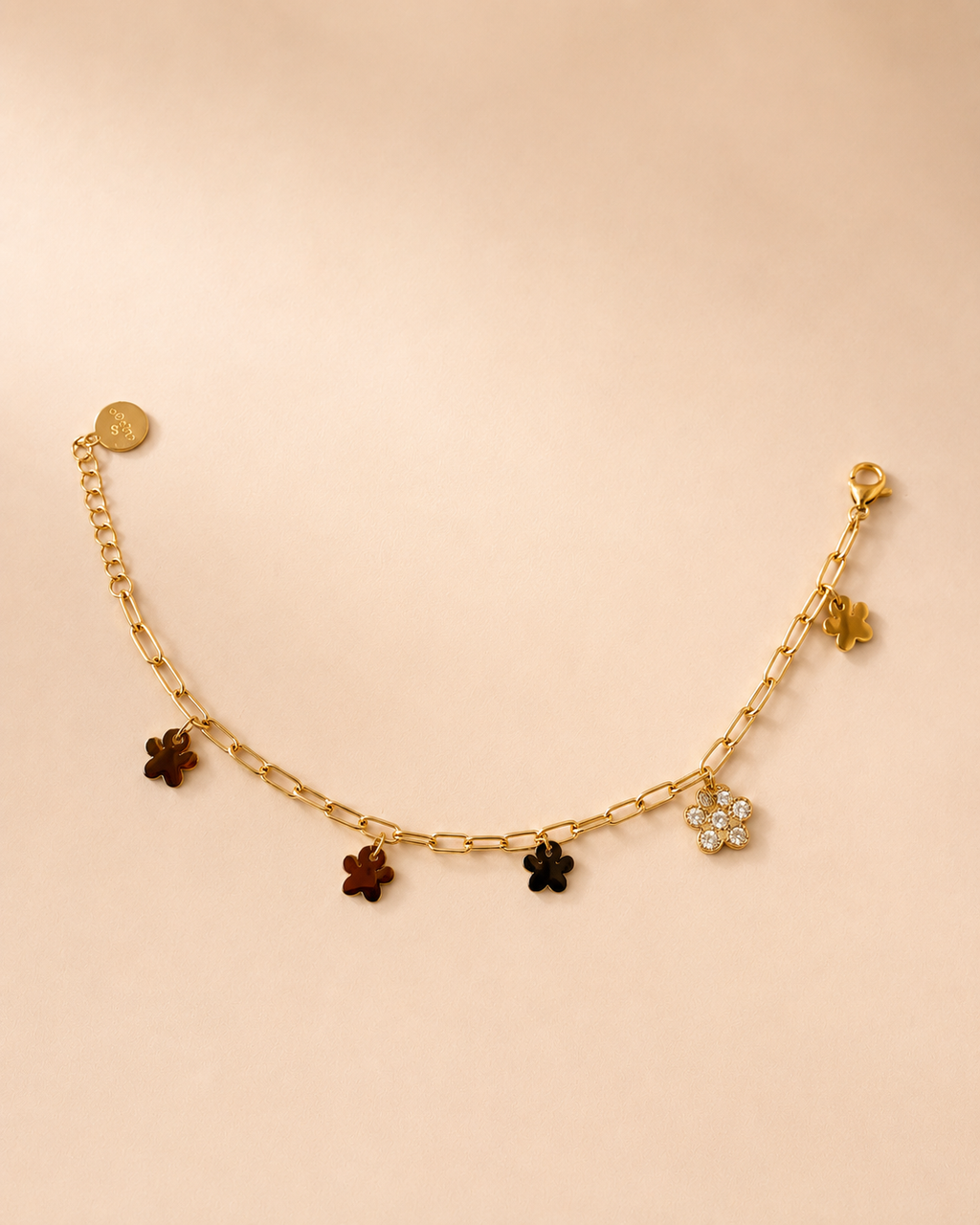 Armbandje hondenpootjes goud