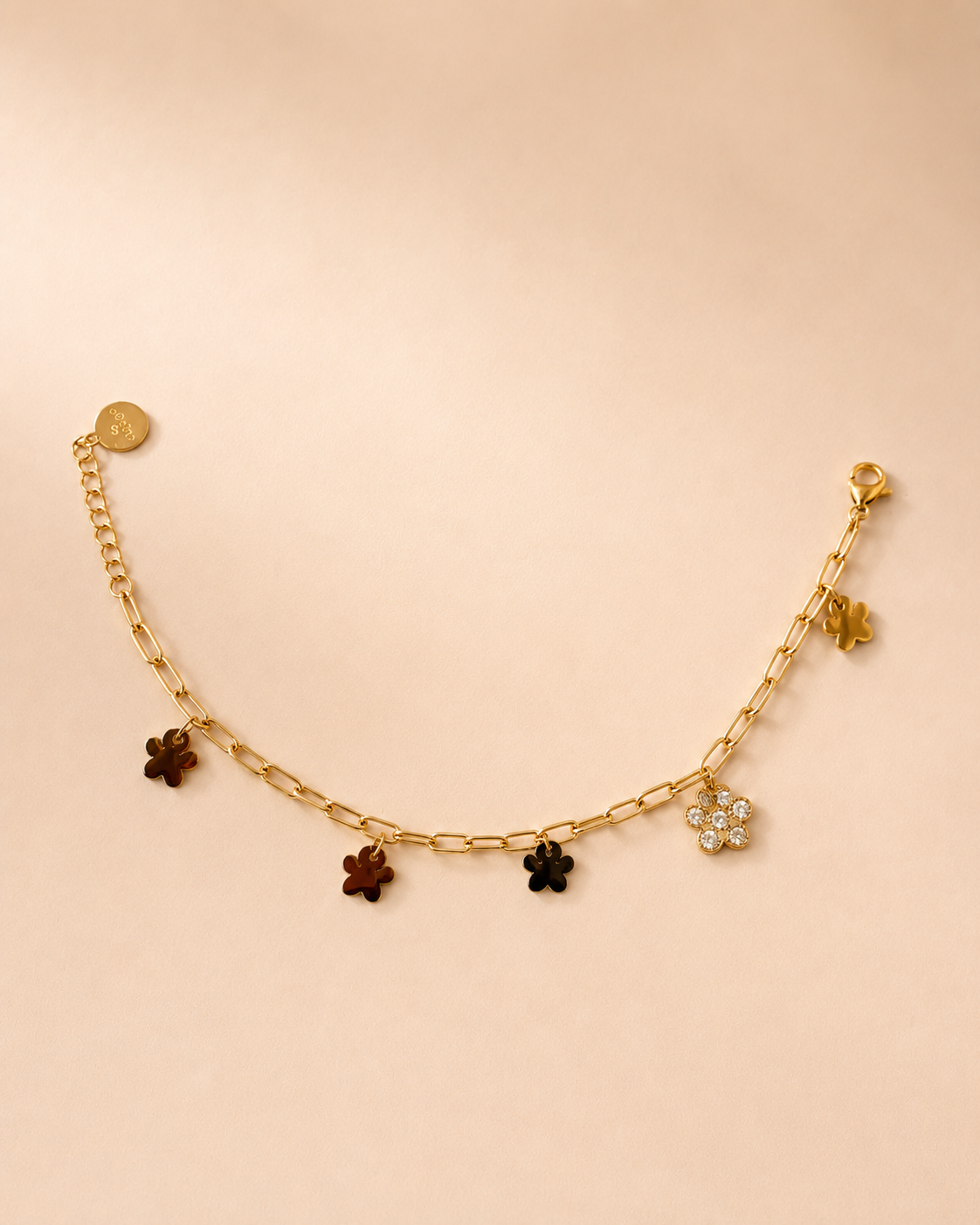 Armbandje hondenpootjes goud
