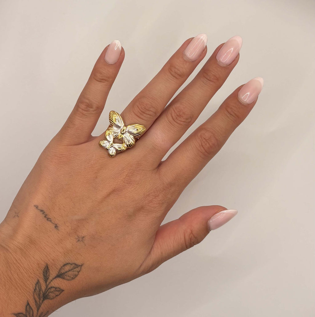 Ring met vlinders goud en zilverkleurig