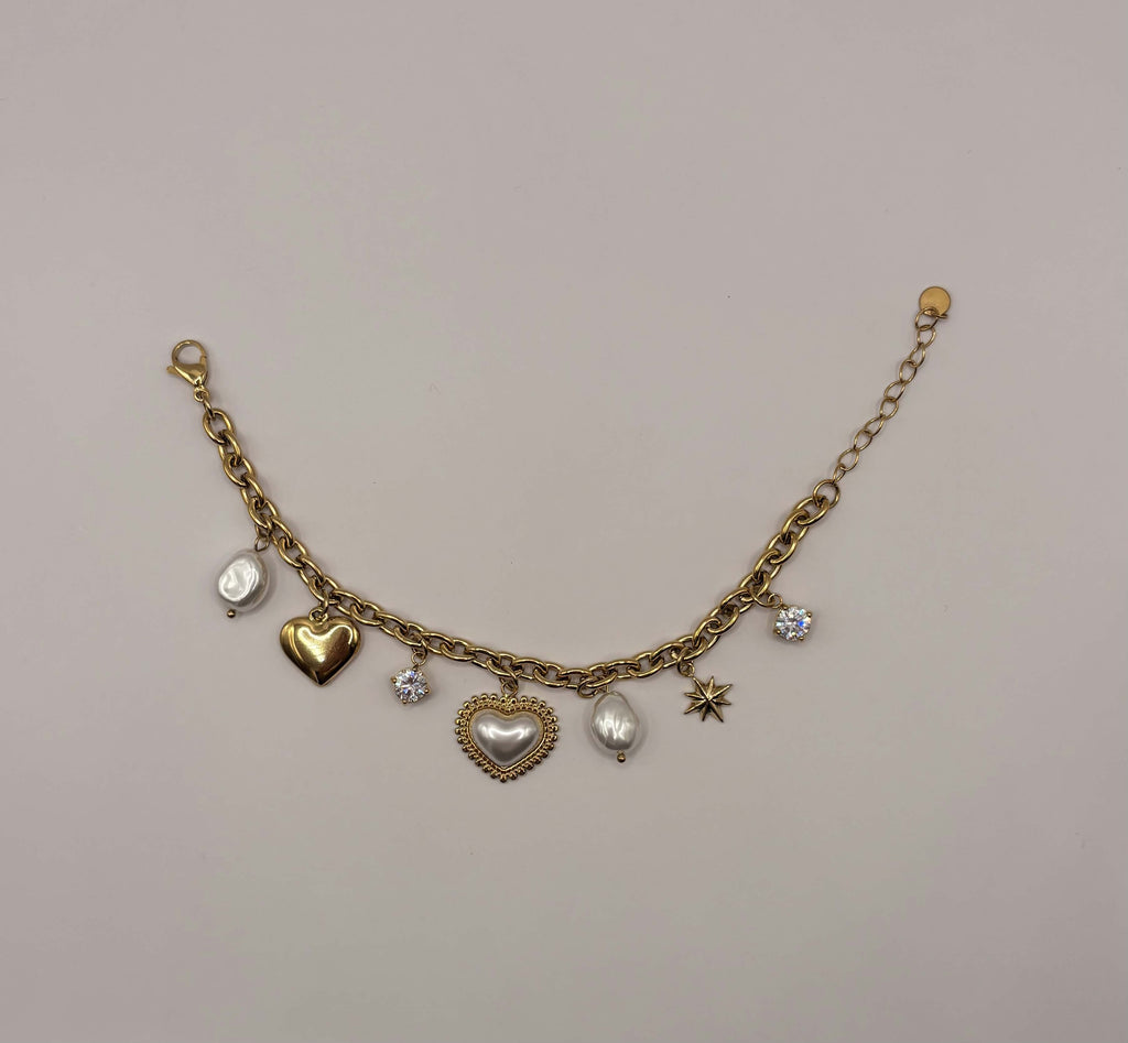 Schakelarmband met multi bedels goudkleurig